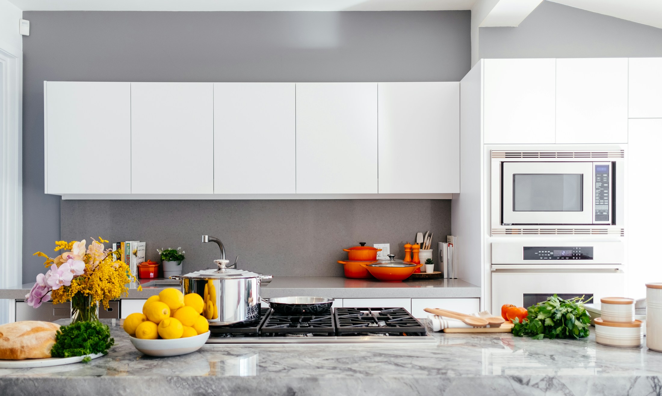 Illustrative interior of a bright kitchen with thoughtfully finished cabinetry